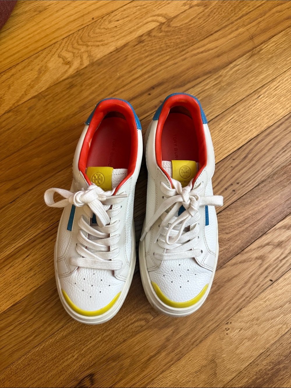 Women’s Tory Burch white leather sneakers with color accents